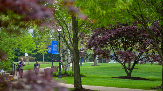 Image of the Campus Green with a Seton Hall banner.
