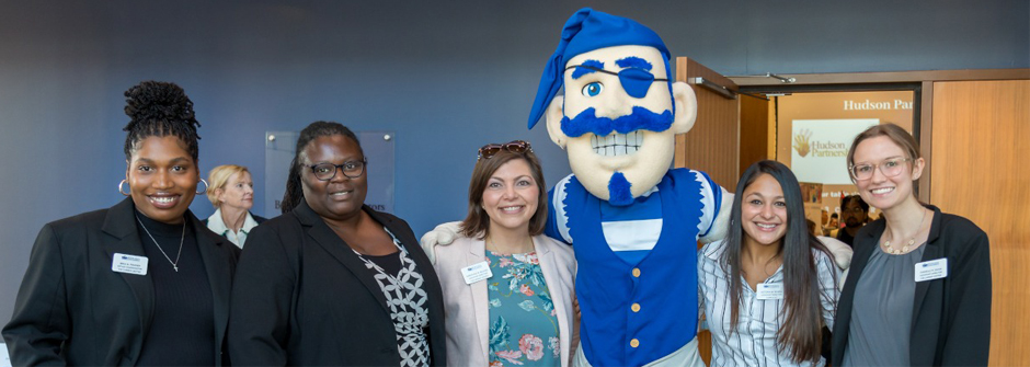 Image of members of the Career Center staff with the Pirate mascot. 