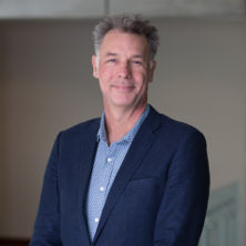 Headshot of Professor Mark Svenvold posing