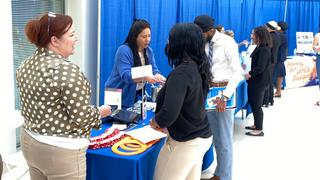Recent Graduates meet employers at Pirate Boot Camp Recent SHU Graduates discuss with employers at career fair