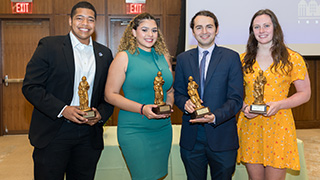 4 recipients holding student servant leader awards