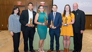 Photo of the 2023 Student Servant Leader Award recipients with Father Colin Kay and Provost Katia Passerini.