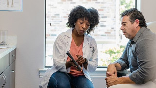 a photo of a nurse and a patient