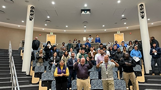 Participants join together at the end of CCRE's Conference