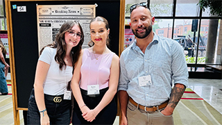 Professor C.J. Urso and his students at the event