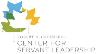 Logo of four different colored leaves hovering over the text 