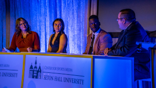 a photo of a panel discussion