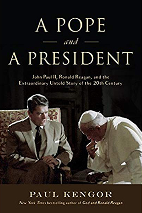 Book cover depicting Ronald Reagan speaking with Pope John Paul II; written by Paul Kregor