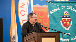 Archbishop Christophe Pierre speaks on stage as part of the World Leaders Forum series.