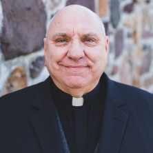 Headshot of Rev. Msgr. William Benwell