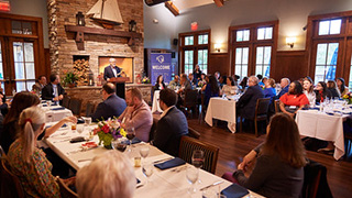 Dean Joseph J. Martinelli speaking at alumni reception. Dean Joseph J. Martinelli speaking at alumni reception.