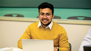 Business Student Working on a Laptop