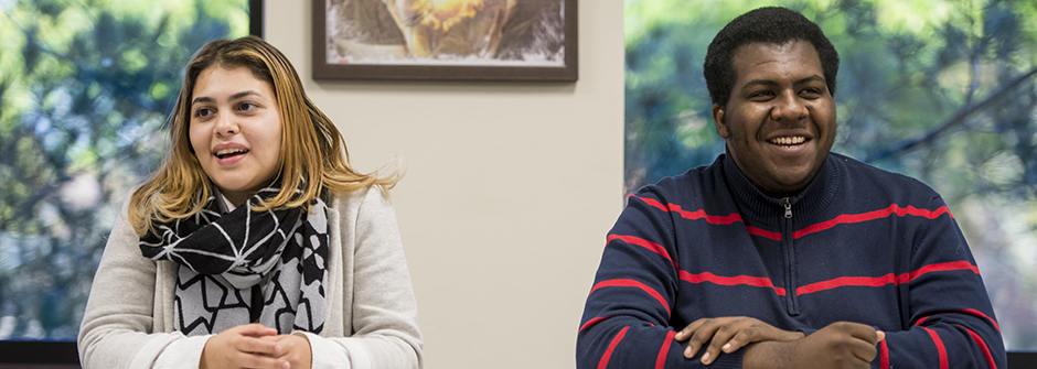 Two students during a class in the College of Human Development, Culture, and Media.