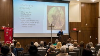 Donna Orsuto, S.T.D., presented throughout the morning, including the pictured presentation titled “Joyful Messengers of Challenging Proposals.”