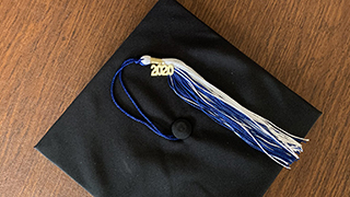 Class of 2020 graduation cap and tassel.