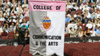 Banner reading College of the Communication Arts at SHU's 2022 Commencement Ceremony