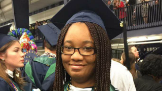 Counseling Student News Story Kristina -1 Kristina Simmonds, Online Counseling Student in a cap and gown.