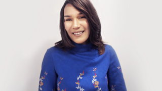 EarleneCruzx320 Earlene Cruz in blue blouse, headshot