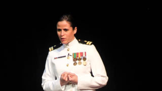 Photo of Egdanis Sierra Torres at a TedX talk