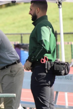 Jesse LeonJessica Collum smiling in sports poloKaprice James at MetlifePhoto of Eric Hernandez