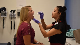 Nurse checking patient 