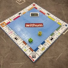 Life-sized Monopoly board, spread out on the floor of the Exploration Studio. 