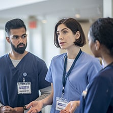 A group of medical professionals having a discussion.