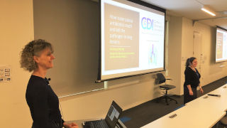 Veronique Dartois, left, presents at the IHS IPE Research Seminar Series on Jan. 24.
