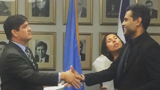 Sushant Naidu receiving a Certificate of Appreciation from President Carlos Alvarado Quesada