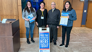 Photo3 3.14.23 Photo of Danielle DiMeglio, Monica Conover (United Way of Northern NJ), Avery Neumark and Danielle Corea-Smith (United Way of Greater Newark) welcoming visitors to the first tax prep session on March 14, 2023.
