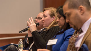 Photo of speakers sitting at the Pirate's Pitch panel