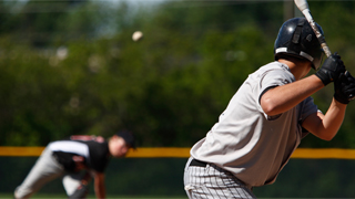 Image of a pitcher at the mound and a batter about to swing. MLB Poll