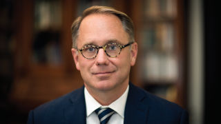 Headshot image of President Joseph E. Nyre