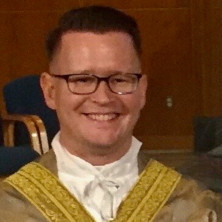 Headshot of Rev. Thomas