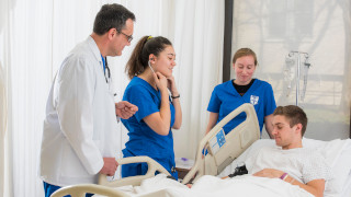 Nursing Students by Bed