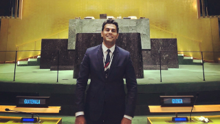Sushant Naidu320x180 Naidu standing ina suit