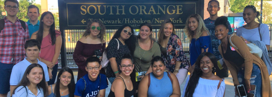A photo of a group of students at the South Orange Train Station