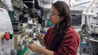 A student working in a lab at Seton Hall.
