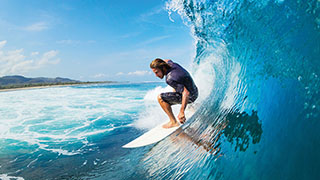 A surfer riding a wave.