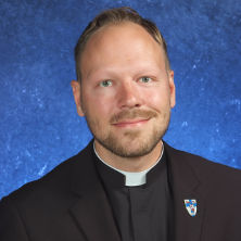 Headshot of Fr. Zack Swantek.