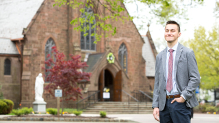 Anthony Tokarz in front of the chapel. 