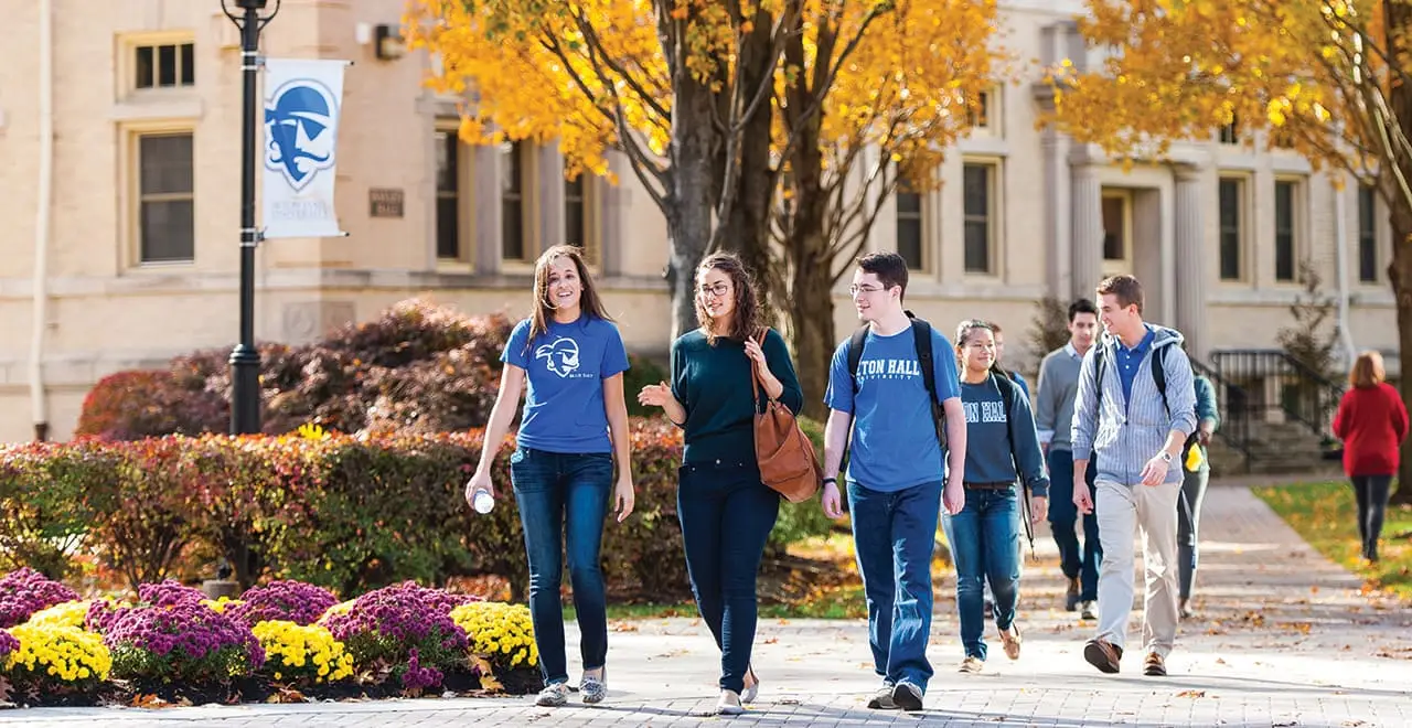 Seton Hall Undergraduate Students Walking on Campus in the Fall
