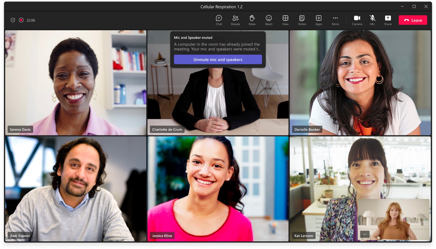 Teams Meeting with six participants and the unmute callout box.