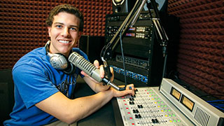 A Photo of a WSOU Student Working at the Radio Station