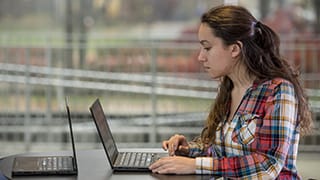 Student Working on a Laptop
