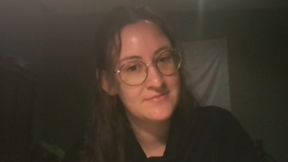Zoe Susser on web camera for virtual event.