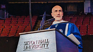 Arthur Brooks addressing graduates at Commencement