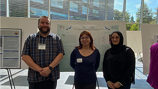 SEED Posters from 2022 with Prof Badillo and students Prof. Joseph Badillo (left), SEED Student Dayannara Vilcarino from Jose Marti Academy in Union City (middle), and Seton Hall Graduate Student Zena Salem (right).