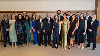 Buccino and Reuter with students and alumni