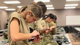 Cadets learn about M4 assembly and functions.
